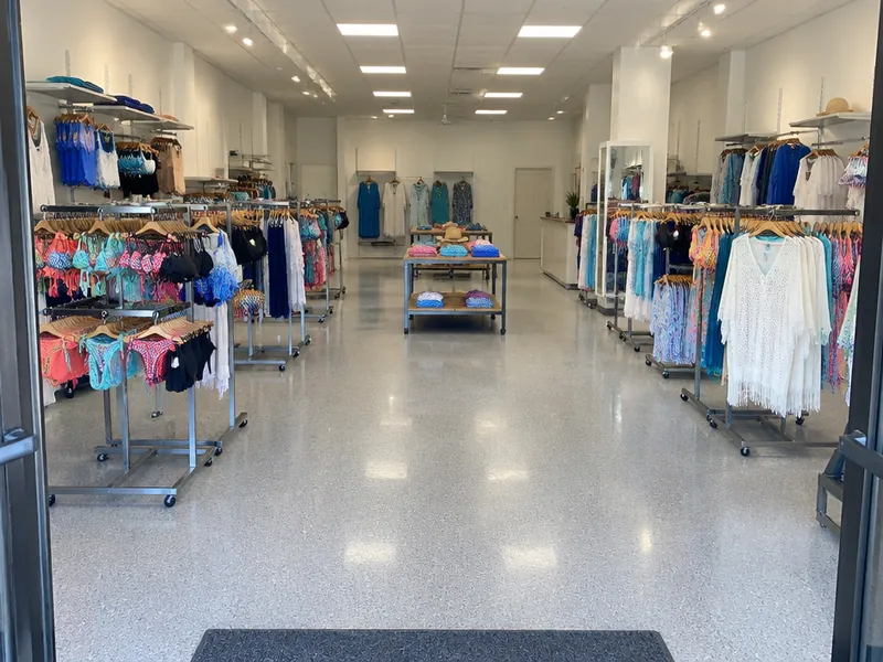 Epoxy flooring in a retail store with a light gray flake floor in Myrtle Beach, SC