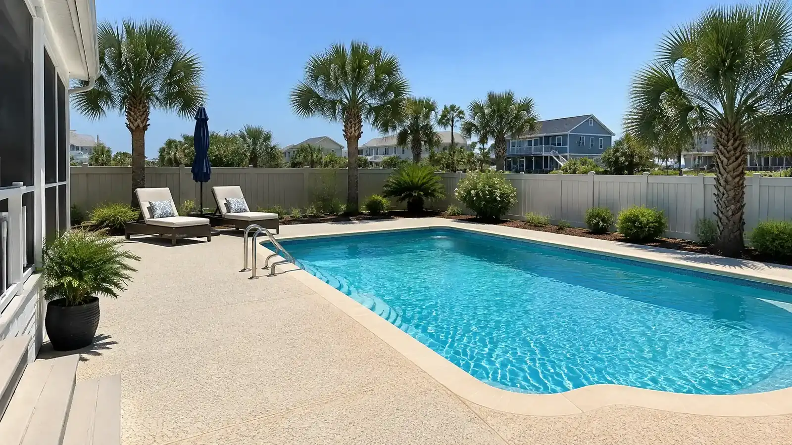 Pool deck coating in Myrtle Beach, SC: light textured knockdown finish around a backyard pool